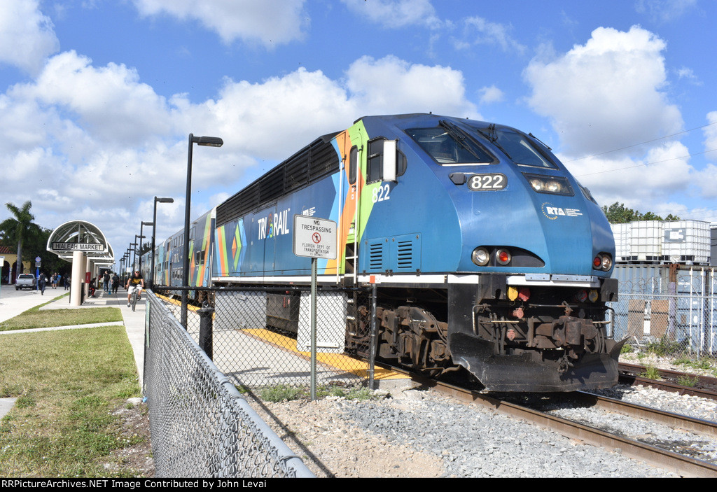 BL36PH # 822 about to lead its Tri-Rail train out of Hialeah Market Station heading south